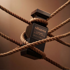 Black Olfazeta by Chogan Luxury N°75 bottle wrapped in beige rope on a warm brown background